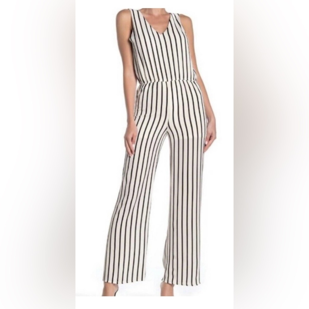 #J30. Love...Ady Stripe Double V Jumpsuit Size Medium. Like new.